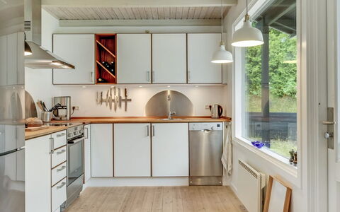 Sverkel - 700M from the Sea: Kitchen, Countertop, Kitchen Appliance, Interior Design, Flooring, Wood, Ceiling, Light Fixture, Major Appliance, Cabinetry
