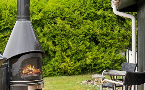Ylermi - 1.5Km from the Sea: Garden, Chimney, Lawn, Cottage, Landscaping, Yard, Wood-Burning Stove, Chair, Design, Hearth
