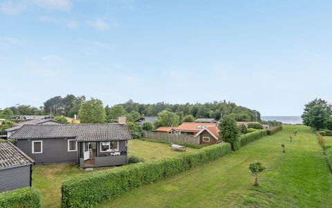 Amilla - 150M from the Sea: Roof, House, Home, Cottage, Door, Siding, Deck, Porch, Plank, Hardwood