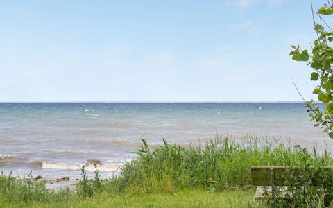 Amilla - 150M from the Sea: Roof, House, Home, Cottage, Door, Siding, Deck, Porch, Plank, Hardwood