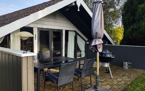 Rieke - 300M from the Sea: Cottage, Shade, Chair, Outdoor Furniture, Hardwood, Siding, Porch, Patio, Deck, Outdoor Structure