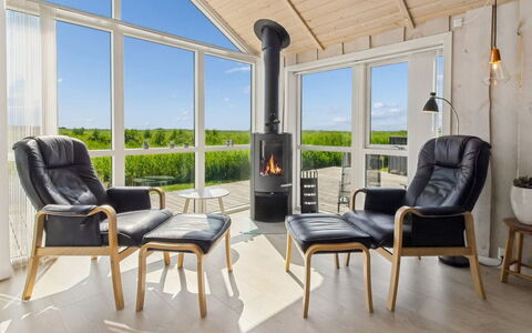 Jonna - 700M from the Sea: Furniture, Chair, Interior Design, Flooring, Wood, Wood Flooring, Living Room, Floor, Couch, Table