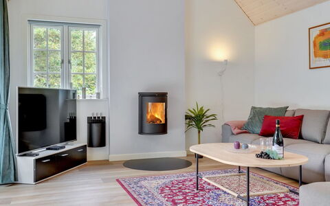Emmeli - 1.2Km from the Sea: Flooring, Floor, Interior Design, Furniture, Wood Flooring, Wood-Burning Stove, Room, Living Room, Hearth, Wood Stain