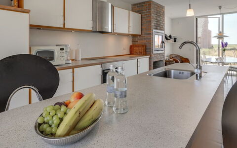 Helgo - 250M from the Sea: Countertop, Kitchen, Interior Design, Cabinetry, Furniture, Flooring, Kitchen Appliance, Ceiling, Light Fixture, Lighting