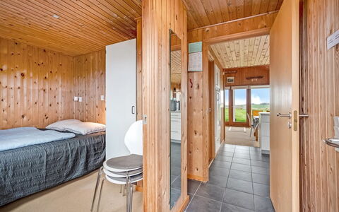 Tanea - 700M to the Fjord: Wood, Floor, Flooring, Ceiling, Interior Design, Bedroom, Hardwood, Wood Stain, Bed, Room