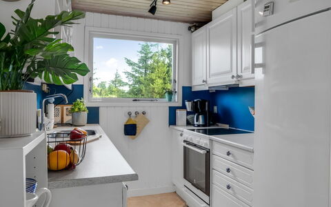 Lykka - 950M from the Sea: Kitchen Appliance, Kitchen, Major Appliance, Countertop, Interior Design, Home Appliance, Cabinetry, Refrigerator, Kitchen Stove, Lighting