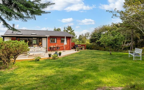Lykka - 950M from the Sea: Grass, Building, House, Shrub, Home, Residential Area, Cottage, Roof, Garden