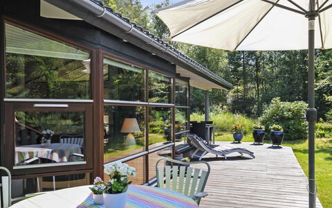 Angja - 800M from the Sea: Furniture, Shade, Home, Porch, Door, Roof, Chair, Cottage, Outdoor Furniture, Outdoor Table
