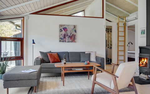 Angja - 800M from the Sea: Furniture, Interior Design, Flooring, Couch, Living Room, Wood, Floor, Room, Wood Flooring, Ceiling