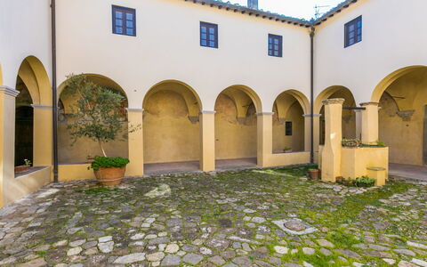 Il Convento: Cloud, Sky, Wood, Plant, Floor, Outdoor Furniture, Flooring, Shade, Chair, Hardwood