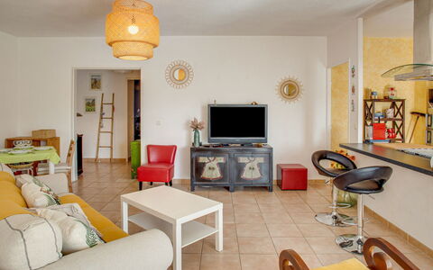 Le Stadium: Picture Frame, Furniture, Property, Couch, Table, Orange, Wood, Interior Design, Yellow, Architecture