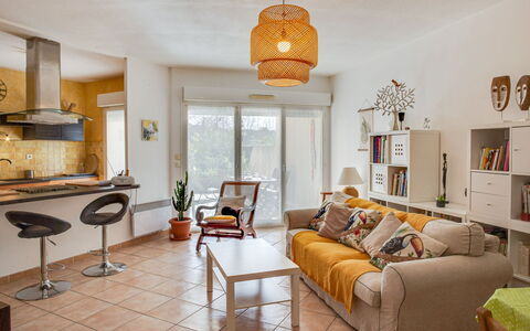 Le Stadium: Furniture, Table, Property, Picture Frame, Couch, Orange, Lighting, Interior Design, Architecture, Living Room