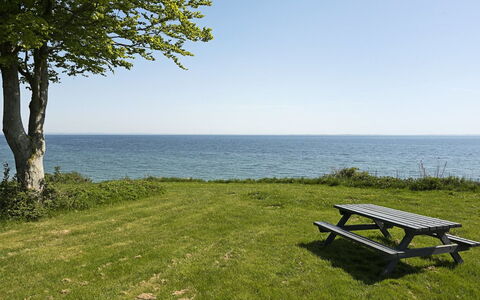 Helena - 250M from the Sea: Blue, Water, Body Of Water, Grass, Furniture, Sea, Coastal And Oceanic Landforms, Outdoor Bench, Horizon, Grassland