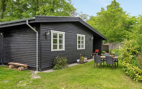 Rohan - 500M from the Sea: Shrub, Cottage, Siding, Garden Buildings, Groundcover, Shed, Garden, Log Cabin, Lawn, Yard