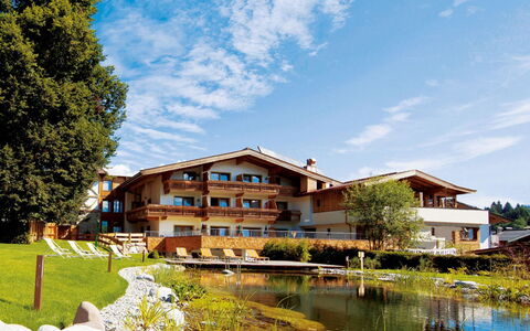Kitzbühel 180: Water, Plant, Building, Property, Sky, Daytime, Swimming Pool, Window, Azure, Blue