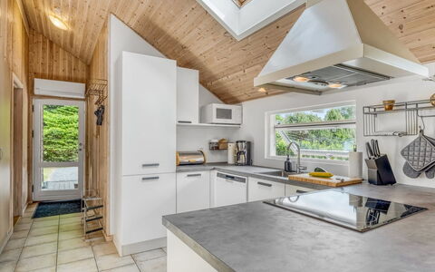 Tialda - 1.3Km from the Sea: Flooring, Wood, Kitchen, Ceiling, Countertop, Interior Design, Floor, Major Appliance, Home, Wood Flooring