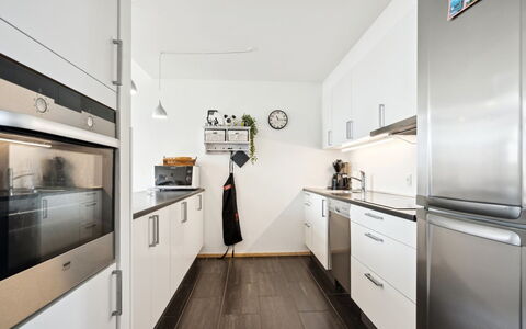 Theis - 100M from the Sea: Kitchen, Kitchen Appliance, Countertop, Flooring, Wood Flooring, Major Appliance, Cabinetry, Floor, Interior Design, Wood
