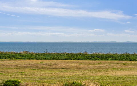 Theis - 100M from the Sea: Sky, Blue, Daytime, Horizon, Grass, Green, Grassland, Ecoregion, Natural Landscape, Cloud