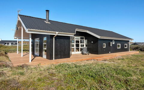 Janni - 250M from the Sea: Roof, House, Home, Cottage, Siding, Estate, Driveway, Garden Buildings, Yard, Shed