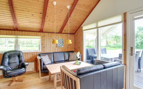 Ejvi - 700M from the Sea: Flooring, Wall, Floor, Interior Design, Wood, Ceiling, Wood Flooring, Lighting, Furniture, Laminate Flooring