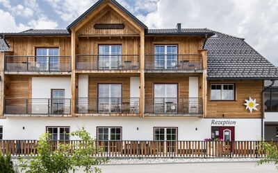 Edelweiss 110.2: Cloud, Building, Plant, Window, Sky, House, Land Lot, Tree, Neighbourhood, Wood