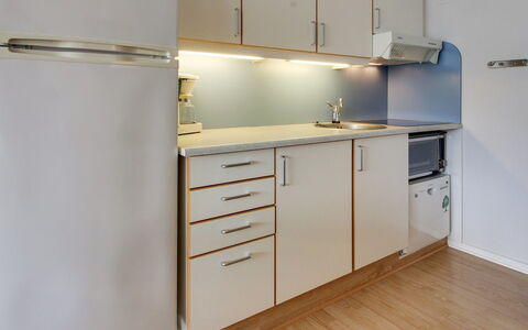 Thoni - 200M from the Sea: Kitchen, Flooring, Countertop, Interior Design, Kitchen Appliance, Wood, Major Appliance, Floor, Cabinetry, Furniture