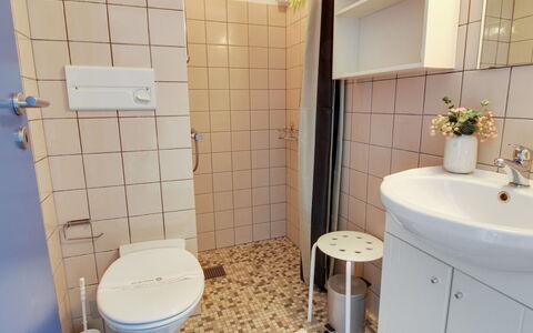Thoni - 200M from the Sea: Bathroom, Bathroom Sink, Toilet Seat, Plumbing Fixture, Toilet, Flooring, Interior Design, Floor, Sink, Tap