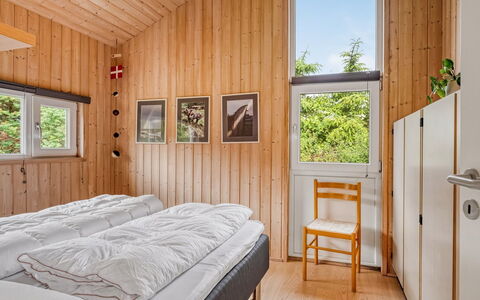 Heggi - 900M from the Sea: Wood, Interior Design, Bedroom, Home, Floor, Hardwood, Ceiling, Bed, Wood Stain, Door