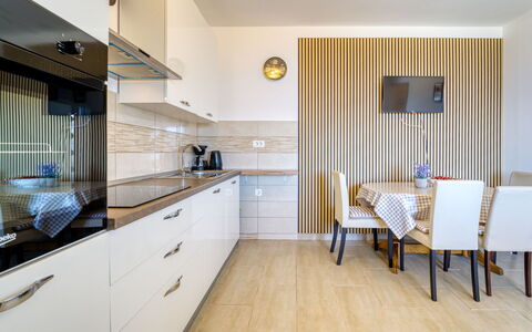 Edita: Interior Design, Flooring, Furniture, Wood, Floor, Countertop, Ceiling, Cabinetry, Kitchen, Room
