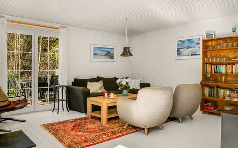 Eimi - 1.5Km from the Sea: Furniture, Interior Design, Couch, Wall, Flooring, Wood, Living Room, Floor, Ceiling, Room