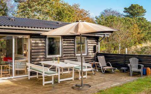 Linnea - 1Km from the Sea: Wood, Porch, Cottage, Roof, Home, Siding, Deck, Garden Buildings, Outdoor Furniture, Shade