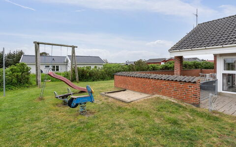 Mari - 400M from the Sea: Sky, Roof, Cloud, Residential Area, Garden, Backyard, Lawn, Cottage, Brickwork, Yard