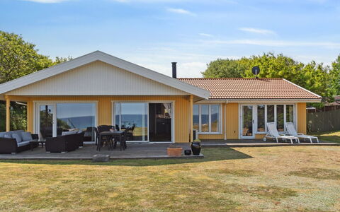 Gjoko - 40M from the Sea: Furniture, Outdoor Furniture, Tableware, Table, Drinkware, Chair, Outdoor Table, Food, Bottle