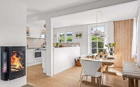Christensen - 100M from the Sea: Furniture, Flooring, Floor, Interior Design, Wood Flooring, Chair, Living Room, Room, Hearth, Hardwood