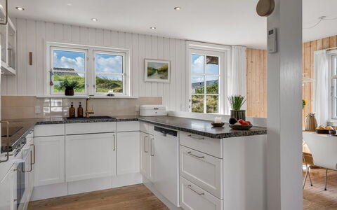 Christensen - 100M from the Sea: Kitchen, Countertop, Flooring, Interior Design, Kitchen Appliance, Cabinetry, Furniture, Wood, Major Appliance, Floor