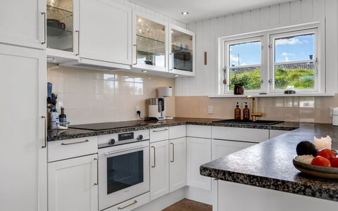 Christensen - 100M from the Sea: Kitchen, Kitchen Appliance, Countertop, Cabinetry, Major Appliance, Interior Design, Flooring, Wood, Home Appliance, Furniture