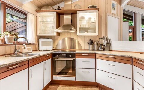 Leevi - 150M from the Sea: Kitchen, Interior Design, Countertop, Wood, Flooring, Cabinetry, Kitchen Appliance, Furniture, Ceiling, Floor