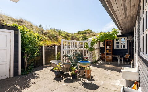 Katri - 500M from the Sea: Door, Home, Flowerpot, Cottage, Houseplant, Yard, Garden, Courtyard, Outdoor Furniture, Chair