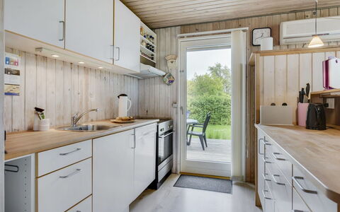 Virpi - 400M from the Sea: Kitchen, Wood, Flooring, Kitchen Appliance, Major Appliance, Countertop, Floor, Interior Design, Furniture, Home