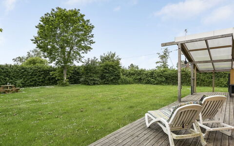 Virpi - 400M from the Sea: Grass, Land Lot, Garden, Shade, Lawn, Landscaping, Backyard, Cottage, Yard, Deck