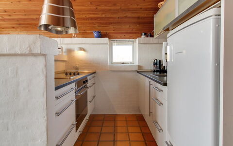 Enwald - 300M from the Sea: Kitchen, Countertop, Flooring, Interior Design, Kitchen Appliance, Furniture, Floor, Cabinetry, Wood, Plumbing Fixture