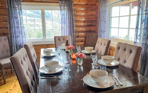 Krampehaugen: Table, Furniture, Tableware, Property, Window, Dishware, Chair, Wood, Textile, Drinkware