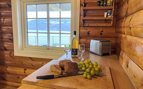 Krampehaugen: Food, Property, Window, Cabinetry, Tableware, Bottle, Wood, Countertop, Interior Design