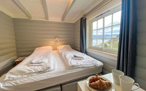 Krampehaugen: Table, Property, Furniture, Tableware, Window, Comfort, Wood, Textile, Interior Design, Bed Frame