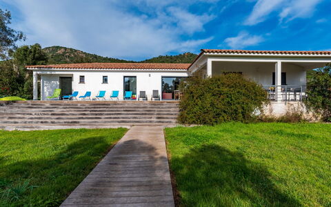 Villa Fautea: Building, Daytime, Sky, Plant, Tree, Arecales, Fence, Terrestrial Plant, Urban Design, Woody Plant