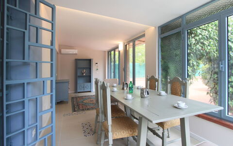 Villa Paola: Table, Furniture, Property, Window, Chair, Wood, Building, Interior Design, Plant