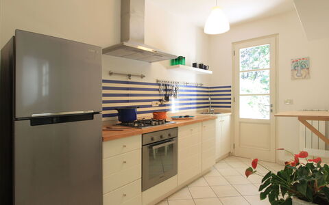 Villa Glicine: Cabinetry, Property, Countertop, Kitchen Stove, Kitchen Appliance, Flower, Plant, Kitchen, Building, Wood