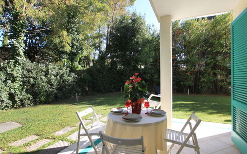 Villa Glicine: Plant, Furniture, Table, Chair, Flower, Tree, Shade, Outdoor Furniture, Building, Outdoor Table