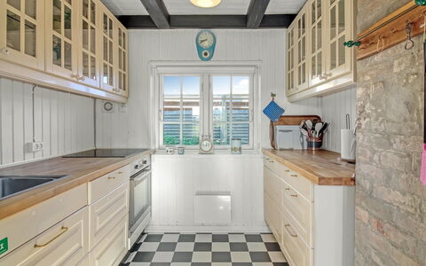 Christin - 275M from the Sea: Kitchen, Flooring, Cabinetry, Wood, Floor, Interior Design, Countertop, Kitchen Appliance, Major Appliance, Furniture