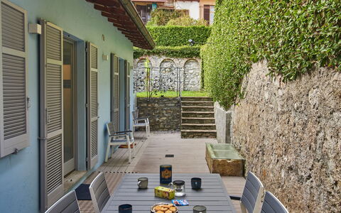 La Tana del Pescatore: Building, Property, Window, Plant, Urban Design, Grass, Condominium, Flooring, Real Estate, Stairs